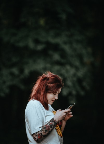 Woman holding a smartphone

